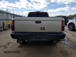 2001 Toyota Tacoma z VIN 5TEPM62N91Z836597, wystawiony jako Copart lot #53106165 z przebiegiem 263 107 mil mil oraz Szkoda całkowita • Salvage title. Historia ofert i sprzedaży dostępna na DreamBid. Obrazek 6.
