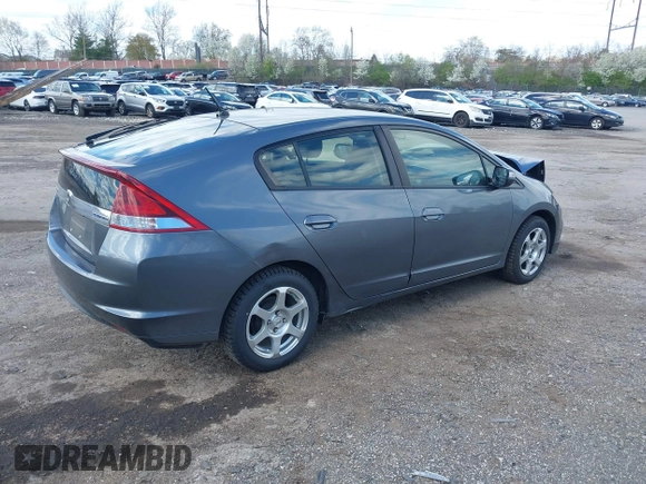 2013 Honda Insight EX z VIN JHMZE2H71DS004170, wystawiony jako IAAI lot #41971733 z przebiegiem 174 000 mil mil oraz . Historia ofert i sprzedaży dostępna na DreamBid. Obrazek 4.