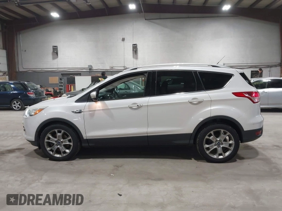 2016 Ford Escape Titanium with VIN 1FMCU9J95GUB02377, listed as a IAAI auction lot 41869557 with 88,441 mi miles. Bid and sale history available at carsss.com. Image 14.