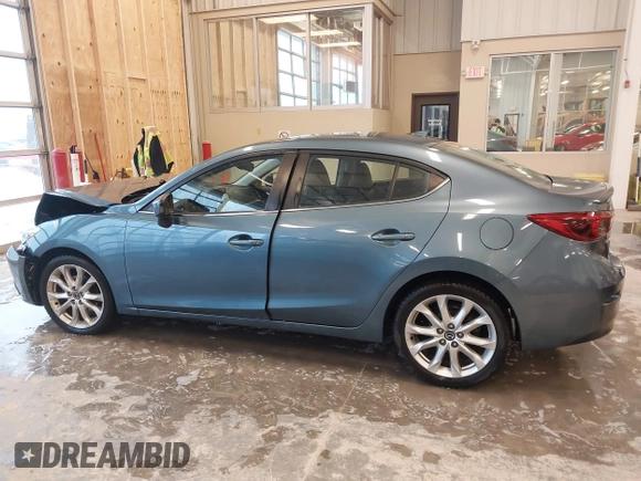 2014 Mazda 3 S Grand Touring with VIN JM1BM1W31E1182703, listed as a IAAI auction lot 41470742 with 123,956 mi miles and . Bid and sale history available at DreamBid. Image 14.
