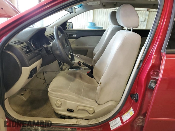 2006 Ford Fusion SE with VIN 3FAFP07Z76R219711, listed as a Copart auction lot 53355135 with 153,722 mi miles and Salvage Title. Bid and sale history available at DreamBid. Image 7.