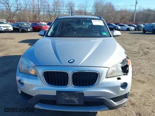 2013 BMW X1 xDrive28i with VIN WBAVL1C57DVR84747, listed as a IAAI auction lot 41273794 with 93,738 mi miles. Bid and sale history available at carsss.com. Image 12.