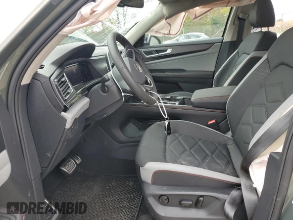 2024 Volkswagen Atlas Peak Edition SE with VIN 1V2CR2CA4RC575859, listed as a Copart auction lot 76310634 with 1,228 mi miles and Salvage title. Bid and sale history available at DreamBid. Image 7.