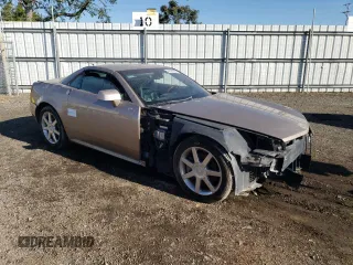 2008 Cadillac XLR z VIN 1G6YV36A585600021, wystawiony jako Copart lot #44195284 z przebiegiem 52 559 mil mil oraz Nie do naprawy. Historia ofert i sprzedaży dostępna na DreamBid. Obrazek 4.