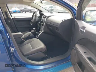 2009 Dodge Caliber SXT with VIN 1B3HB48C89D125855, listed as a IAAI auction lot 41930478 with 66,403 mi miles and . Bid and sale history available at DreamBid. Image 5.