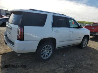 2015 GMC Yukon Denali z VIN 1GKS2CKJ9FR622342, wystawiony jako Copart lot #53671555 z przebiegiem Nie podano mil oraz Czysty tytuł • Clean title. Historia ofert i sprzedaży dostępna na DreamBid. Obrazek 3.