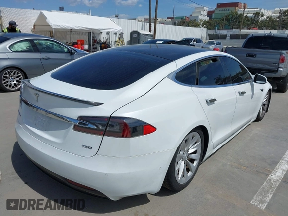 2018 Tesla Model S 75D with VIN 5YJSA1E25JF245269, listed as a IAAI auction lot 41914567 with 56,086 mi miles and . Bid and sale history available at DreamBid. Image 4.