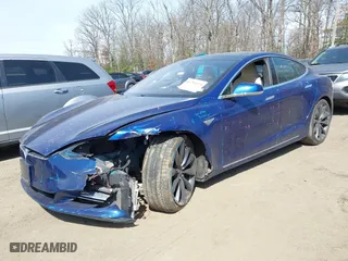 2016 Tesla Model S 90D with VIN 5YJSA1E20GF141040, listed as a IAAI auction lot 41784624 with 94804 miles. Bid and sale history available at carsss.com. Image 19.