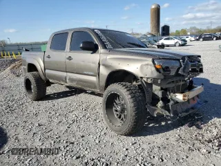 2014 Toyota Tacoma PreRunner with VIN 5TFJU4GN6EX057271, listed as a Copart auction lot 49977155 with 155,478 mi miles and Salvage Title. Bid and sale history available at carsss.com. Image 4.