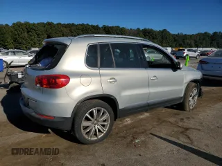 2014 Volkswagen Tiguan SE with VIN WVGAV3AX9EW611860, listed as a Copart auction lot 74431754 with 116,022 mi miles and Salvage title. Bid and sale history available at DreamBid. Image 3.
