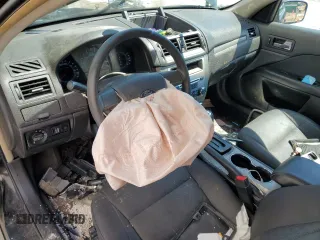 2012 Ford Fusion SE z VIN 3FAHP0HGXCR117692, wystawiony jako Copart lot #56026555 z przebiegiem 236 669 mil mil oraz Szkoda całkowita • Salvage title. Historia ofert i sprzedaży dostępna na DreamBid. Obrazek 8.