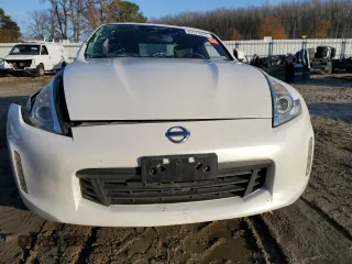 2014 Nissan 370Z Touring with VIN JN1AZ4EH8EM631324, listed as a Copart auction lot 85573524 with 0 mi miles and Salvage Title. Bid and sale history available at carsss.com. Image 5.