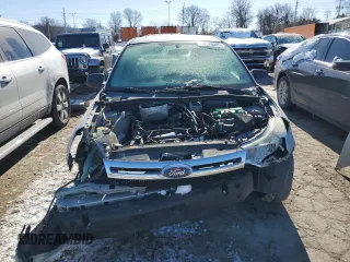 2008 Ford Focus S with VIN 1FAHP34N88W142973, listed as a Copart auction lot 44119005 with 199,115 mi miles and Salvage Title. Bid and sale history available at carsss.com. Image 5.