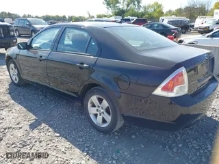 2007 Ford Fusion SE with VIN 3FAHP07Z27R148461, listed as a IAAI auction lot 40509576 with 120,500 mi miles. Bid and sale history available at carsss.com. Image 3.