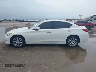 2015 Infiniti Q50 Premium z VIN JN1BV7AR6FM402481, wystawiony jako IAAI lot #41957004 z przebiegiem 171 913 mil mil oraz . Historia ofert i sprzedaży dostępna na DreamBid. Obrazek 14.