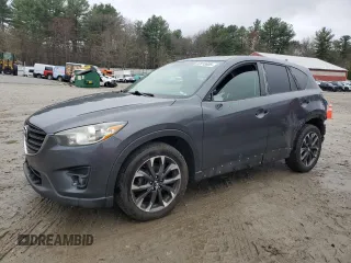 2016 Mazda CX-5 Grand Touring with VIN JM3KE4DY6G0834583, listed as a Copart auction lot 52015905 with 184,741 mi miles and Salvage Title. Bid and sale history available at DreamBid. Image 1.