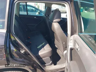2015 Volkswagen Tiguan SE with VIN WVGAV7AX5FW509612, listed as a IAAI auction lot 42020599 with 64,201 mi miles and . Bid and sale history available at DreamBid. Image 8.