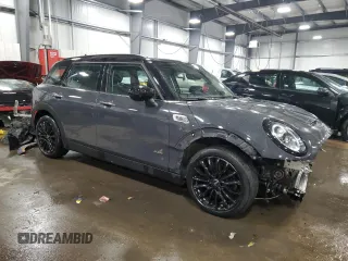 2021 MINI Clubman Cooper S with VIN WMWXJ1C05M2P49901, listed as a Copart auction lot 83023554 with 49,357 mi miles and Salvage Title. Bid and sale history available at carsss.com. Image 4.