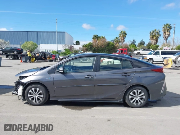 2022 Toyota Prius LE with VIN JTDKAMFP7N3206830, listed as a IAAI auction lot 41984239 with 57,681 mi miles and . Bid and sale history available at DreamBid. Image 14.