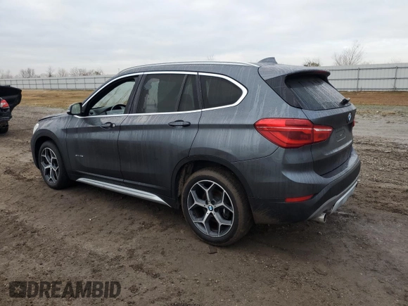 2017 BMW X1 sDrive28i with VIN WBXHU7C3XH5H38074, listed as a Copart auction lot 43088995 with 98,820 mi miles and Salvage Title. Bid and sale history available at carsss.com. Image 2.
