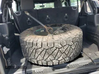 2018 Jeep Wrangler Unlimited Sport S с VIN 1C4HJXDG7JW152968, выставлен на аукционе Copart как лот 61130215 с пробегом 60 796 миль миль и Списание • Salvage title. История ставок и продаж доступна на DreamBid. Изображение 13.