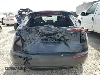 2021 Mazda CX-30 Select z VIN 3MVDMBBL7MM244948, wystawiony jako Copart lot #56252025 z przebiegiem 33 987 mil mil oraz Szkoda całkowita • Salvage title. Historia ofert i sprzedaży dostępna na DreamBid. Obrazek 6.
