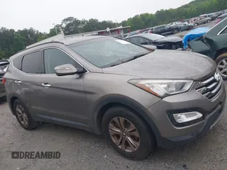2015 Hyundai Santa Fe z VIN 5XYZU3LB4FG264397, wystawiony jako IAAI lot #42362877 z przebiegiem 177 252 mil mil oraz . Historia ofert i sprzedaży dostępna na DreamBid. Obrazek 13.