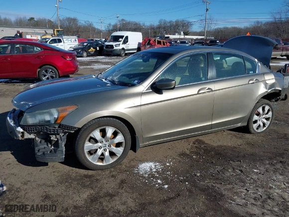 2009 Honda Accord Sdn EX-L with VIN 1HGCP26869A028055, listed as a IAAI auction lot 41620790 with 176044 miles. Bid and sale history available at carsss.com. Image 2.