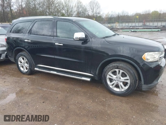 2013 Dodge Durango Crew with VIN 1C4RDHDG5DC613835, listed as a IAAI auction lot 41910643 with 155,827 mi miles and . Bid and sale history available at DreamBid. Image 1.