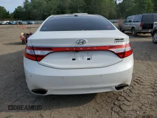 2014 Hyundai Azera Limited z VIN KMHFH4JG3EA352749, wystawiony jako Copart lot #55457525 z przebiegiem Nie podano mil oraz Szkoda całkowita • Salvage title. Historia ofert i sprzedaży dostępna na DreamBid. Obrazek 6.