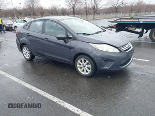 2012 Ford Fiesta SE with VIN 3FADP4BJ0CM155729, listed as a IAAI auction lot 41800447 with 90,091 mi miles. Bid and sale history available at carsss.com. Image 1.
