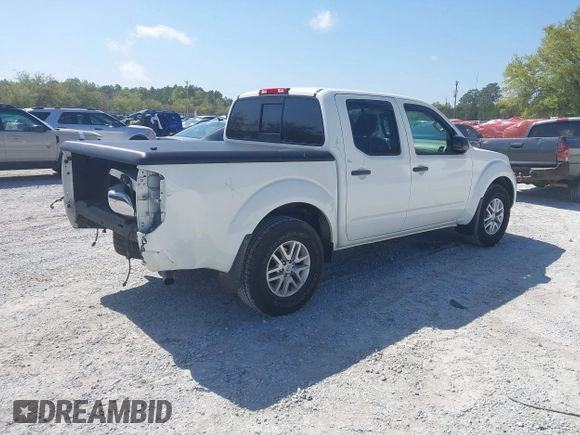 2015 Nissan Frontier SV with VIN 1N6AD0ER0FN746599, listed as a IAAI auction lot 41944073 with 63,347 mi miles and . Bid and sale history available at DreamBid. Image 4.