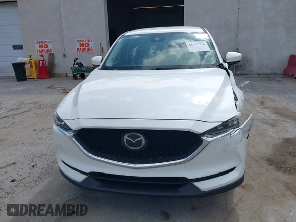 2018 Mazda CX-5 Touring with VIN JM3KFBCMXJ0353369, listed as a IAAI auction lot 41902554 with 154,104 mi miles and . Bid and sale history available at DreamBid. Image 13.