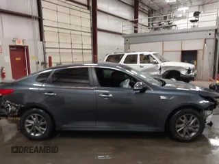 2019 Kia Optima LX with VIN 5XXGT4L33KG375854, listed as a IAAI auction lot 42235507 with 87,789 mi miles and . Bid and sale history available at DreamBid. Image 14.