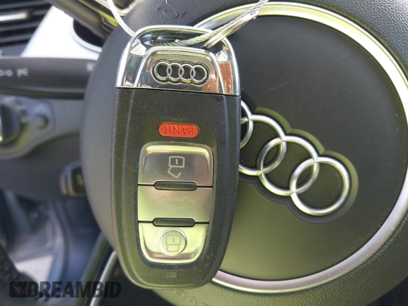 2015 Audi A4 Premium Plus z VIN WAUEFAFL7FN035865, wystawiony jako IAAI lot #41958619 z przebiegiem 67 704 mil mil oraz . Historia ofert i sprzedaży dostępna na DreamBid. Obrazek 11.