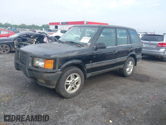 1999 Land Rover Range Rover z VIN SALPV1440XA412936, wystawiony jako IAAI lot #42271704 z przebiegiem 156 881 mil mil oraz . Historia ofert i sprzedaży dostępna na DreamBid. Obrazek 2.