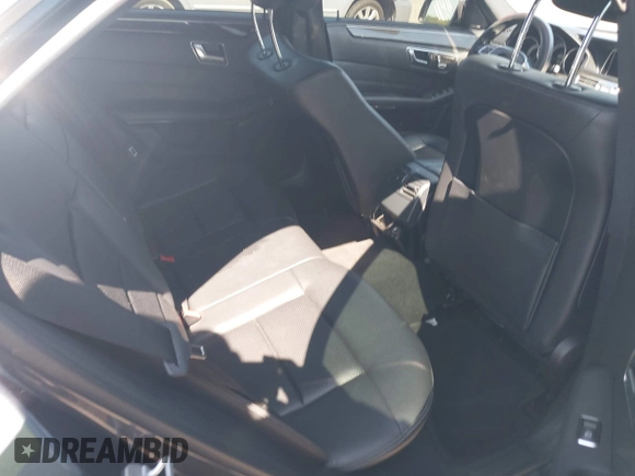 2014 Mercedes-Benz E 350 Sport with VIN WDDHF5KB8EA985121, listed as a IAAI auction lot 42124448 with 96,412 mi miles and . Bid and sale history available at DreamBid. Image 8.