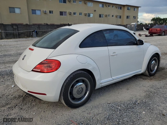 2012 Volkswagen Beetle 2.5L w/Sun PZEV with VIN 3VWJP7ATXCM631497, listed as a Copart auction lot 74442964 with 72,097 mi miles and Salvage Title. Bid and sale history available at carsss.com. Image 3.
