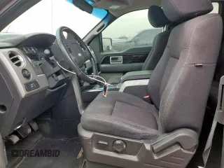 2010 Ford F-150 XL with VIN 1FTFX1CV9AKB84802, listed as a Copart auction lot 56970445 with 220,404 mi miles and Salvage title. Bid and sale history available at DreamBid. Image 7.