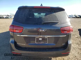 2021 Kia Sedona LX with VIN KNDMB5C1XM6671806, listed as a Copart auction lot 83027514 with 58,884 mi miles and Salvage Title. Bid and sale history available at carsss.com. Image 6.