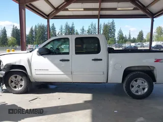 2013 Chevrolet Silverado 1500 LT with VIN 3GCPKSE71DG358722, listed as a IAAI auction lot 42128592 with 206,779 mi miles and . Bid and sale history available at DreamBid. Image 14.