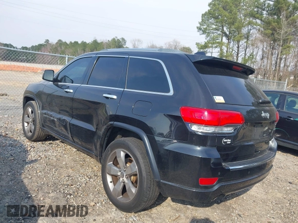 2014 Jeep Grand Cherokee Overland with VIN 1C4RJECG4EC197433, listed as a IAAI auction lot 41769932 with 198,568 mi miles. Bid and sale history available at carsss.com. Image 3.