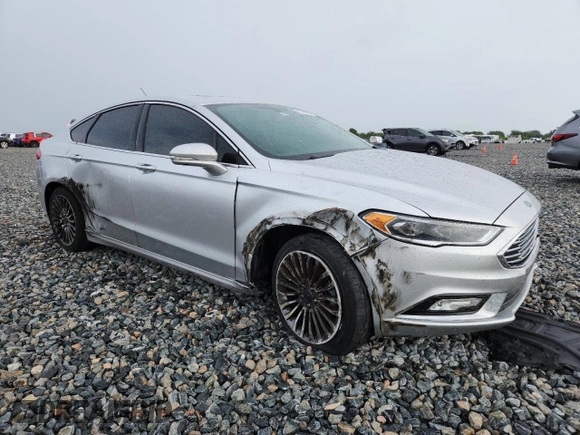 2018 Ford Fusion Titanium with VIN 3FA6P0D91JR207051, listed as a Copart auction lot 59539135 with 204,017 mi miles and Salvage title. Bid and sale history available at DreamBid. Image 4.