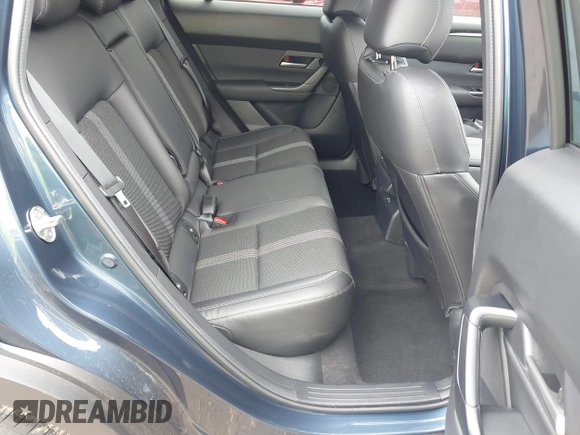 2025 Mazda CX-50 2.5 S Preferred Package with VIN 7MMVABBM6SN331993, listed as a IAAI auction lot 41910160 with 9,818 mi miles. Bid and sale history available at carsss.com. Image 8.
