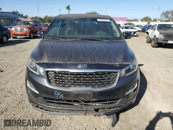 2021 Kia Sedona EX with VIN KNDMB5C11M6673086, listed as a Copart auction lot 42244935 with 57,698 mi miles and Salvage Title. Bid and sale history available at carsss.com. Image 5.