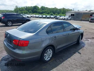 2013 Volkswagen Jetta S with VIN 3VW2K7AJ5DM285488, listed as a IAAI auction lot 42521944 with 132,655 mi miles and . Bid and sale history available at DreamBid. Image 4.