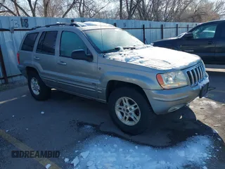 2001 Jeep Grand Cherokee Limited with VIN 1J4GW58N91C688438, listed as a IAAI auction lot 41830334 with 184,420 mi miles. Bid and sale history available at carsss.com. Image 1.