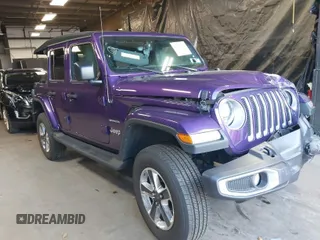 2023 Jeep Wrangler High Altitude z VIN 1C4HJXEG8PW527662, wystawiony jako IAAI lot #41205522 z przebiegiem 27 759 mil mil oraz . Historia ofert i sprzedaży dostępna na DreamBid. Obrazek 1.