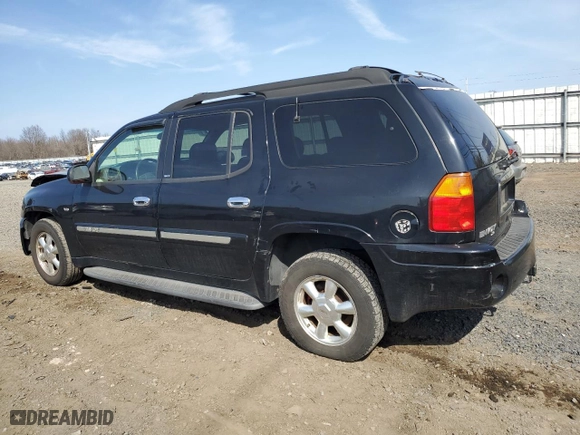 2003 GMC Envoy XL SLT with VIN 1GKET16PX36243554, listed as a Copart auction lot 49083975 with 148,596 mi miles and Salvage Title. Bid and sale history available at carsss.com. Image 2.