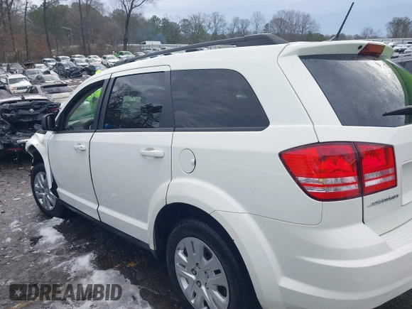 2018 Dodge Journey SE with VIN 3C4PDCAB1JT295988, listed as a IAAI auction lot 41226385 with 106,639 mi miles. Bid and sale history available at carsss.com. Image 14.